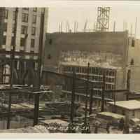 Sepia-tone photo of steel frame erection & fireproof stage house for the Fabian Theatre, Newark & Washington Sts., Hoboken, Feb. 27, 1928.