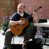          02 2011 Garden Tour: Randy entertaining at barbecue
   