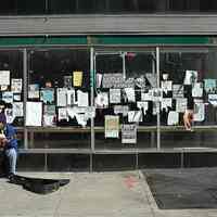Two digital images: storefront at 227 Washington Street with Burczy posters & other notices on it, Hoboken, April 20, 2006.