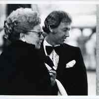 B+W photo of Dolly Sinatra with actor Noel Harrison, n.p. (probably L.A., CA), n.d., ca. 1975-1977.