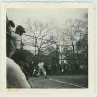 B+W photo of a baseball game at Stevens Park with a view from the bench of a player at bat, Hoboken, no date, ca. 1950.