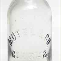 Bottle: Motel & Co., Cor. of 8th & Garden Sts., Hoboken, N.J. N.d., ca. 1920-1930.