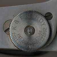          detail of knob with name and patent dates
   