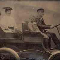 Tintype photo of a family posed in a open automobile, no place, no date, ca. 1900.