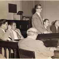 Digital image of b+w photo of Mayor Fred M. DeSapio addressing Commissioners, City Hall, Hoboken, no date, ca. 1947-51.