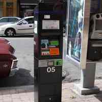 Color photos, 8, of Muni-meter kiosks & related signage, Hoboken, Apr. 14, 2012.