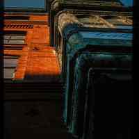 Color slide of detail view of the bay windows at 300 Grand on the NW corner with 3rd looking up