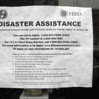          Img_3909 typical Disaster Assistance flier posted in window
   