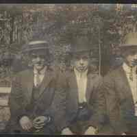 Digital image of photo of three young men in suits seated outdoors, no place, no date, circa 1900-1915.