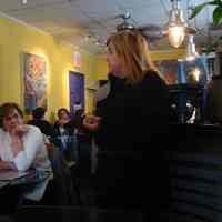 Digital copy of color photo of food tour members inside Zafra Kitchen, 301 Willow Ave., Hoboken, Oct. 18, 2003.