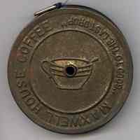 Tape measure case made with a Maxwell House Coffee can lid; Keuffel & Esser 50