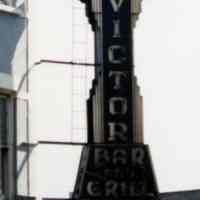          2: detail of hanging sign - Hotel Victor Bar and Grill
   