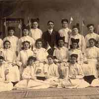 Digital image of group photo of Our Lady of Grace School calisthenics class with instructor Julius Durstewitz, Hoboken, May, 1916.