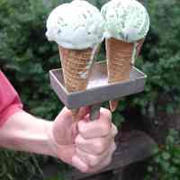Digital images, 2, of an Italo Marchiony ice cream sandwich mold displayed as a cone holder, Hoboken, August 5, 2004.