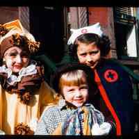 Color slide of three children in costumes.