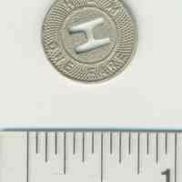 Metal coin token of the Hudson & Manhattan Rail Road, no date, ca. 1944.