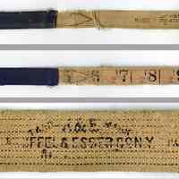          tape: front, back and detail of maker's markings
   