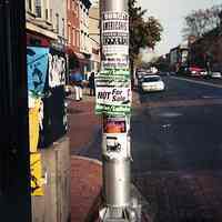 Digital image: Light pole at southwest corner of Second and Washington Sts. with Burczy poster, Hoboken, 2000.