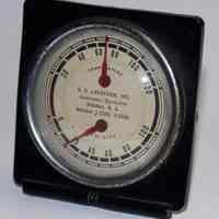 Dial table thermometer - relative humidity indicator; promotional item issued by O.O. Lauckner, Insurance, Hoboken, n.d., ca. 1936-1956.