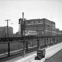 B+W photo negative of PSCT streetcar on trestle above Observer Highway west of Clinton St/, Hoboken, n.d., ca.1945.