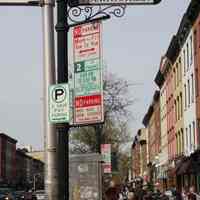          098 parking signs at SE corner 4th & Washington; typical display
   