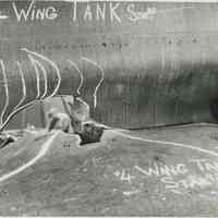 B+W photo of interior view of structural damage #4 wing tank starboard in an unidentified vessel at the Bethlehem Steel Shipyard, no date, ca. 1940.