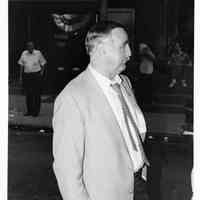 B+W photo of unidentified man with election badge on election night, Hoboken, [ June 11, 1985].