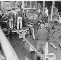 B+W photo of workers repairing main deck of unknown ship, Hoboken, no date, ca. 1940.