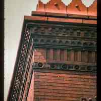          Color slide of detail view of parapet, brick cornice and friezes at 800 Hudson on the NW corner with 8th picture number 1
   