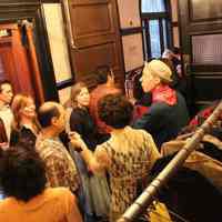          1113 main entry, coat check (Bill Curran wearing hat)
   