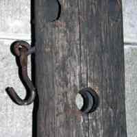          section below top turnings with through holes; hanging hook hardware
   