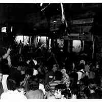 B+W photo of Tom Vezzetti supporters outside his campaign headquarters, 536 Washington St., on election night, Hoboken, [June 11, 1985].