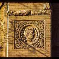 Color slide of close-up view of decorative tile on the side façade of the Columbia Club at 1101 Bloomfield on the corner of 11th and Bloomfield