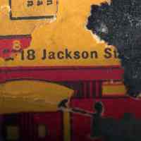          closer detail, rotated, of label left side with Hoboken street address
   