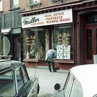 Digital image of color photo the exterior of John Muller business, 930 Washington St., Hoboken, December, 1965.