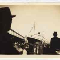 Sepia-tone photo of a ship arriving or departing from Pier 4?, Hoboken, n.d., ca. 1938.