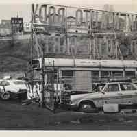 B+W photo of Hoboken Auto Body sign and junkyard, (620 Jackson St.), Hoboken, no date, ca. 1970-1975.