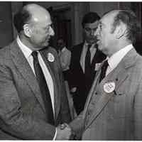 Digital image of B+W photo of Mayor Steve Cappiello (right) shaking hands with New York Mayor Ed Koch, New York?, 1985.