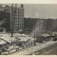 Sepia-tone photo of progress on foundation construction on the site for the Fabian Theatre, Newark & Washington Sts., Hoboken, Jan. 30, 1928.