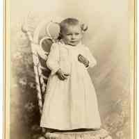 Cabinet photo of a baby posed in photographer