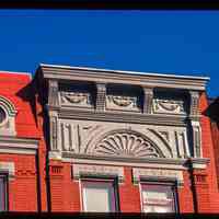          Color slide of detail view of cornice, frieze, window heads, brick pilasters and oculi window at 1123 Washington between 11th and 12th picture number 1
   