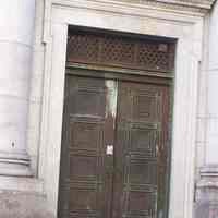          16: First Street main entrance; double-leaf bronze doors
   