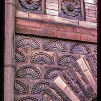 Color slide of detail view of portico semicircular arch and decorative tiles at 105 4th between Washington and Bloomfield