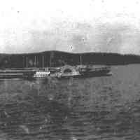 B+W negative image of a side-wheeler dayliner or coastal steamer, no place, no date, ca. 1900-1910.