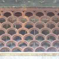          18: detail of iron grill work above main doors
   