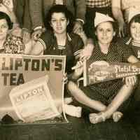          detail of women with poster
   