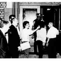 B+W photo of Mayor Steve Cappiello and others entering a building probably on election night, Hoboken, [ June 11, 1985].