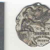 Medal: City of Hoboken Safe & Sane Fourth medal for senior running broad jump, Hoboken, 1915.