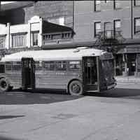 B+W photo negative of Washington Street Line bus no. 42 on Hudson Place & River St., Hoboken, n.d. (1946).