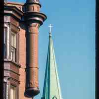          Color slide of detail view of turret and bay window at 801 Washington on the NE corner of Washington and 8th and the steeple of St. Matthew Trinity Lutheran church on the SE corner of 8th and Hudson picture number 1
   